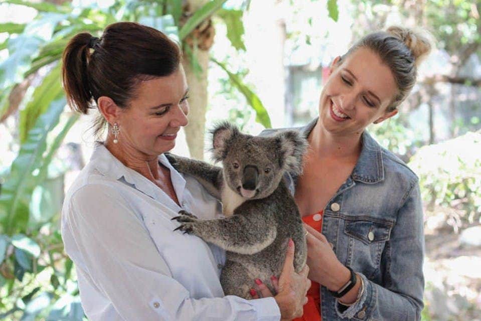 Lone Pine Koala Sanctuary: Entry Ticket Two ladies cuddling a koala